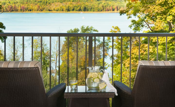LittleLake-home-outdoor_balcony_overlooking_lake Amica Little Lake's outdoor patio, overlooking the lake and surrounding forests.