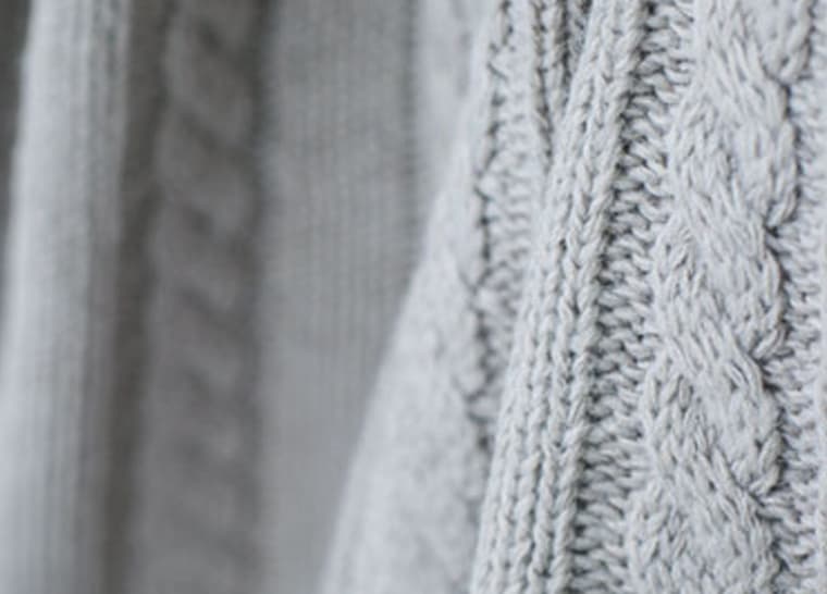 Amica Additional Memory Care Services Grey knit blanket