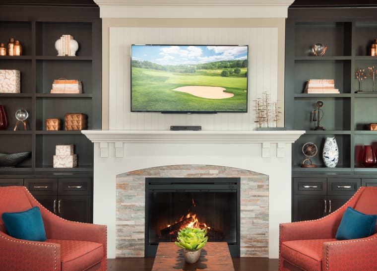 Amica Little Lake Fireplace Lounge Fireplace lounge at Amica Little Lake senior living residence.