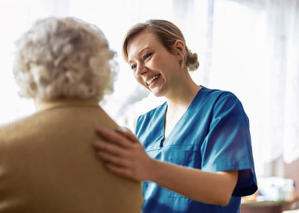Amica Conversations how to find the right Memory Care community A friendly personal support worker helping an senior woman