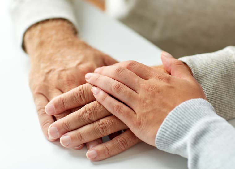 Helping Hands New 760x546 Holding hands with senior for Amica helping hands.