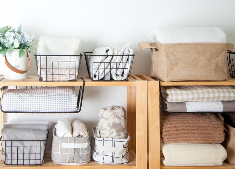 Amica National Event Mindful Downsizing using the Marie Kondo mehtod Blankets and towels home supplies organized neatly with organizers and containers